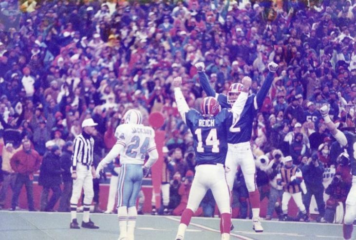 Frank Reich (14) and teammate Steve Christie celebrate.
