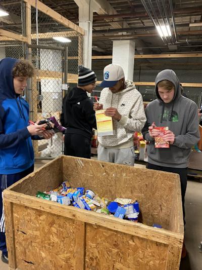 Jaiman Johnson, Braden Fuller, Jase Smith and Gage Swanson, are pictured working.