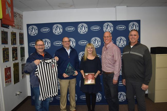Roger MacTavish’s daughter, Meredith, center, is flanked by International Association of Approved Basketball Officials Board 39 members.