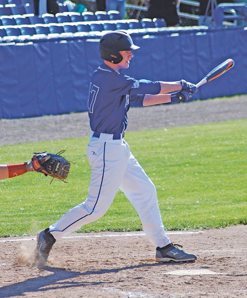 Eric Fermier takes a swing.