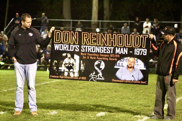 Alex Conti, right, is shown with Athletic Director Greg Lauer.