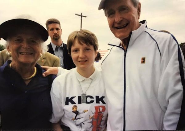 Barbara Bush, Christina Kebort and former President George Bush pose for a picture.