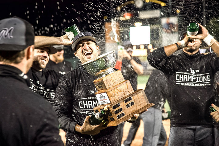Milwaukee Milkmen manager Anthony Barone receives the Miles Wolff Trophy.