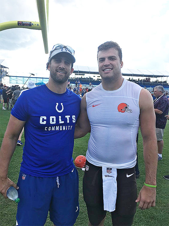 Indianapolis Colts offensive coordinator Nick Sirianni, left, and Cleveland Browns tight end Stephen Carlson.