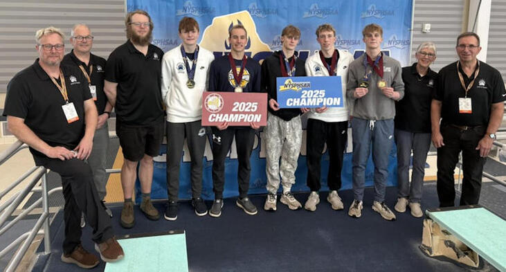 The Frewsburg/Falconer/Jamestown/Southwestern swimmers and coaching staff pose for a photo after a record-setting at the NYSPHSAA Championships at Ithaca College on Saturday. 