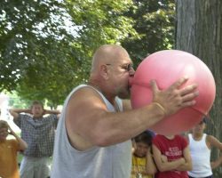 Don Reinhoudt demonstrates how to blow up a hot water bottle.