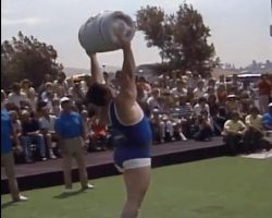 Don Reinhoudt performing a feat of strength.