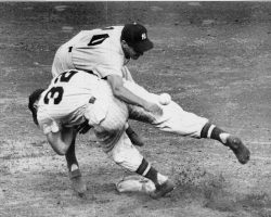 Irv Noren #32 Washington Senators bowls over Phil Rizzuto #10 NY Yankees to break up a double play in 1950. Irv Noren #32 Washington Senators bowls over Phil Rizzuto #10 NY Yankees to break up a double play in 1950