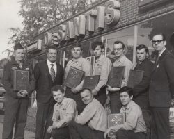 Lou DeSantis (second from left in back row) with his service department in front of his Lincoln-Mercury dealership on West Third Street in Jamestown, 1972. Lou DeSantis, 1972.