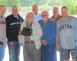 Joining in the dedication of the Little League field in Walt Brown’s name are, from the left, Bradley Brown, grandson; Kris Brown, grandson; Arden Johnson, Town of Ellery supervisor; Tom Brown, son; Barry Brown, son; John Cresanti, Town of Ellery council member; Doug Brown, grandson; and Andy Brown, grandson. October 2018. P-J photo by Scott Kindberg. Joining in the dedication of the Little League field in Walt Brown’s name are, from the left, Bradley Brown, grandson; Kris Brown, grandson; Arden Johnson, Town of Ellery supervisor; Tom Brown, son; Barry Brown, son; John Cresanti, Town of Ellery council member; Doug Brown, grandson; and Andy Brown, grandson. October 2018.