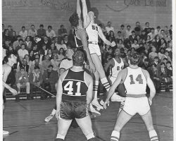 Donn Johnston reaches for the tip. 1968. Donn Johnston reaches for the tip. 1968.