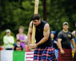 Nick Kahanic competing in caber toss.
