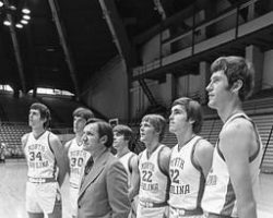 Legendary UNC coach Dean Smith with
players from his 1972-73 team. Left to right: Bobby Jones, John O'Donnell, Ray Hite, George Karl, Darrell Elston, and Donn Johnston. Legendary UNC coach Dean Smith with players from his 1972-73 team. Left to right: Bobby Jones, John O'Donnell, Ray Hite, George Karl, Darrell Elston, and Donn Johnston.