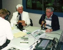 Jim Riggs, Russ Diethrick, John O'Neil being interviewed and Greg Peterson (back to camera).