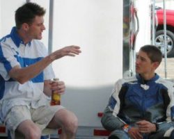 Shawn  Higbee(left) giving advice to rider Billy Veatch