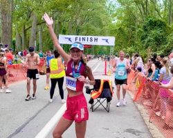 Jennifer Giebner Donato at the Erie Marathon finish line.
