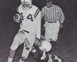 Dan Wolfe carries the ball, 1968. Dan Wolfe carries the ball, 1968.