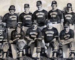 1973 See-Zurh House softball team. Front row: Pat Traniello, Bob Schmitt, Bob Burns, Ev Matlock, Terry Woodfield. Back row: Tim Brown, Joe DiMaio, Randy Shenefiel, Ken Martin, Ron Frederes, Dan Harnish, Brian Brown. 1973 See-Zurh House softball team