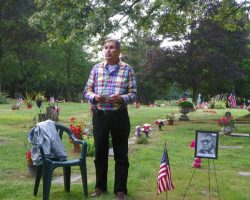 Bruce Widen at Tony LeVoie's gravesite.