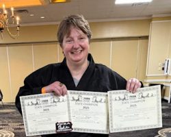 Christina Kebort was awarded 1st in Women’s Master Weapons & Kata, 2nd in Women’s Master 50+ Sparring and Overall Master Grand Champion Title on November 15, 2025.