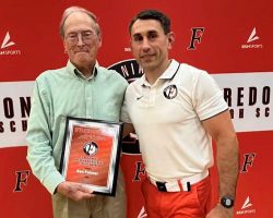 Dan Palmer (left) receives the inaugural "Dan Palmer Fredonia High School Service Award" from Fredonia Central School Athletic Director Nick Bertrando, June 2026. Dan Palmer (left) receives the inaugural "Dan Palmer Fredonia High School Service Award" from Fredonia Central School Athletic Director Nick Bertrando, June 2026.
