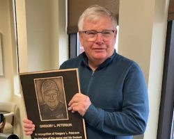 Greg Peterson in May 2026 with plaque he was presented. Greg Peterson in May 2026 with plaque he was presented.