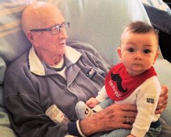 Doc Malinoski holding his great-grandson Ian in February 2014, five months before Doc passed away.