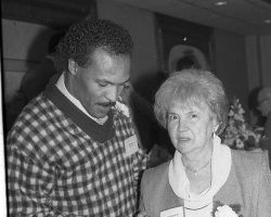 Robb Riddick of the Buffalo Bills looks over the CSHOF induction ring presented to Josephine Mistretta, the widow of inductee Morris Mistretta, 1987.