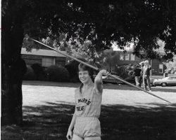 Karen Tellinghuisen with a javelin, 1977.