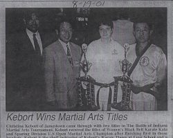 Kebort Wins Martial Arts Titles. August 19, 2001.
