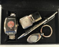 Watch, money clip, pen, and key ring presented to Paul Cooley by the International Association of Approved Basketball Officials following 50 years as a basketball referee.
