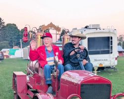 Paul Cooley riding in the 1940 Gerry Fire Department truck.