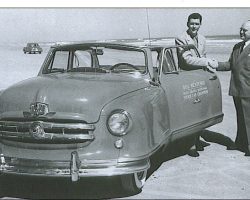 Bill Rexford (left) accepts the keys to a 1951 Nash Rambler for winning the NASCAR championship in 1950.