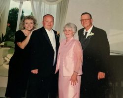 Left to right: Kristal Hungate and Mark Rodgers, his children and his wife, Janet, with Larry Rodgers.