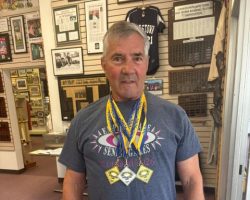 Mike Sayers won gold medals in javelin and discus and a silver in shot put in the 70-74 age group.
