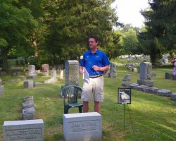 Scott Kindberg at John O'Neil's gravesite.