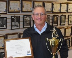 Charlie LaDuca shows off the Men’s Senior Baseball League Father/Son World Series championship trophy.