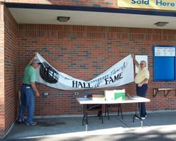 Hanging the banner.