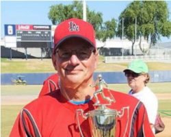 Charlie LaDuca holds the Men’s Senior Baseball League World Series championship trophy.