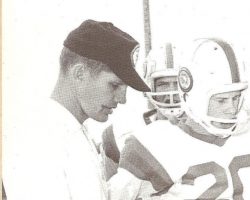 Flash Olson coaching football.