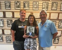 Grandson Ted, daughter Cindy Dilts, son Chris Olsen visit the CSHOF in July 2022.