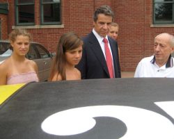 Sammy LaMancuso discussed his restored race car with Governor Andrew Cuomo. Sammy LaMancuso discussed his restored race car with Governor Andrew Cuomo.